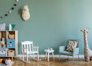 Spacious child's playroom design with cute cupboard