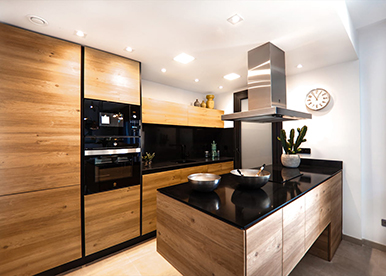 Sturdy brown and black modular kitchen with island