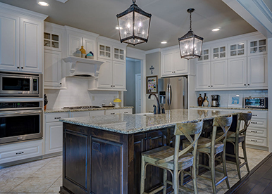 Elegant wooden island and cream modular kitchen