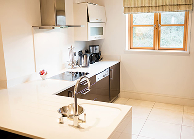 Modular L-Shaped Kitchen with Sleek Neutrals