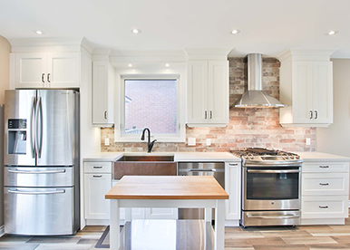 Classic white modular kitchen with ample storage